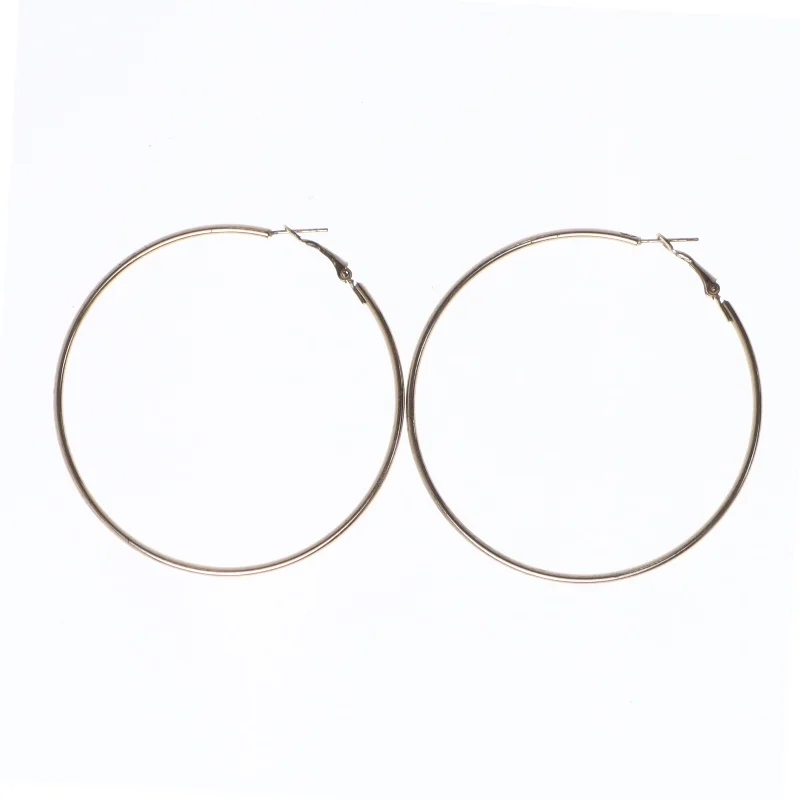 Store øreringe i guld farve (str. Ø 7 cm)