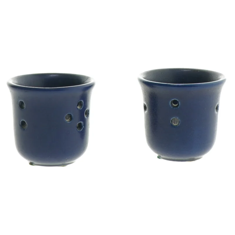 Blå lysestager med huller (str. 6x6 cm)