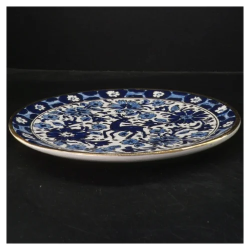 Dekorativ porcelænstallerken med blåt mønster (str. Ø 27 cm)