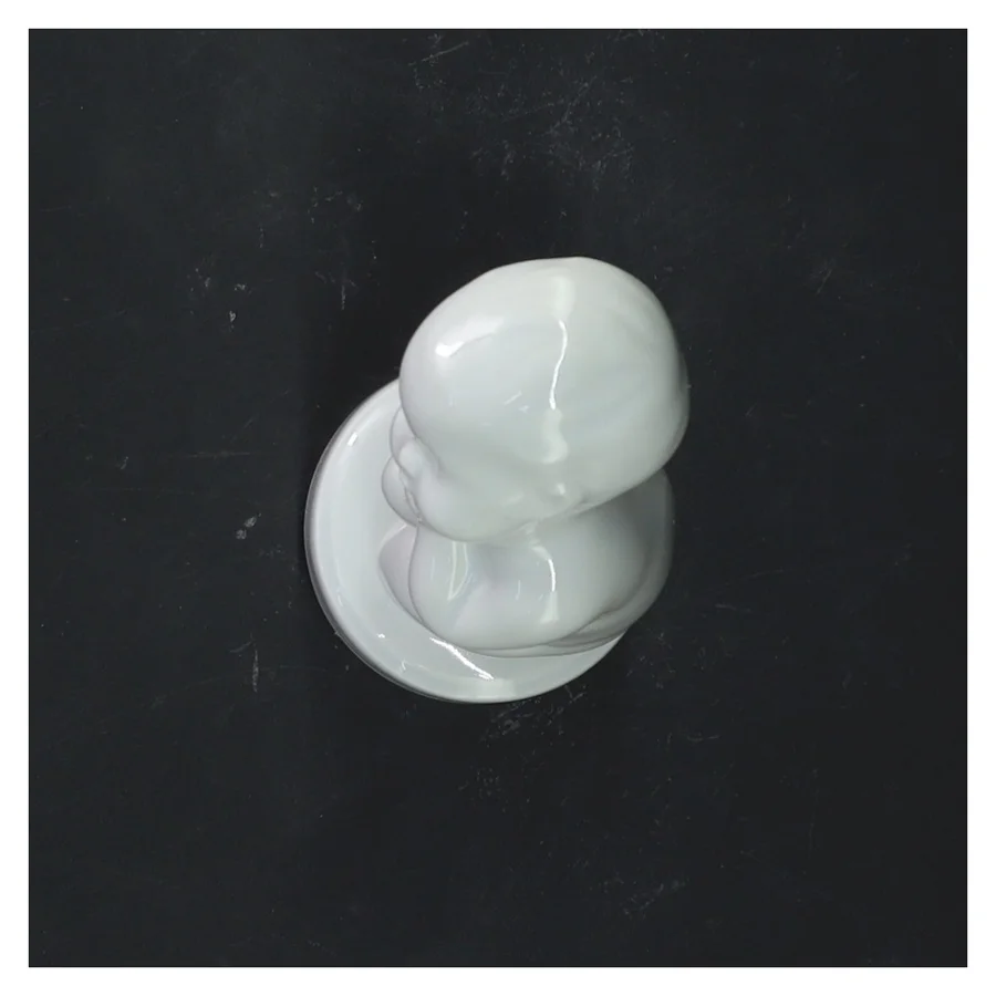 Porcelænsfigur af barn fra Royal Copenhagen (str. 12 cm)