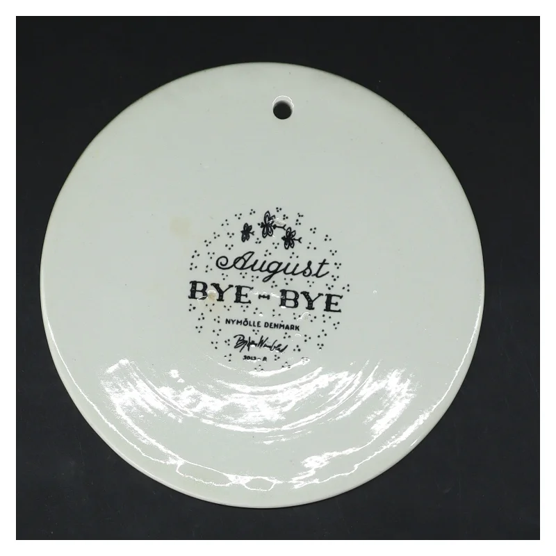 Dekorativt vægskilt med illustration fra Bjørn Wiinblad, Nymølle (str. Ø 15,5 cm)