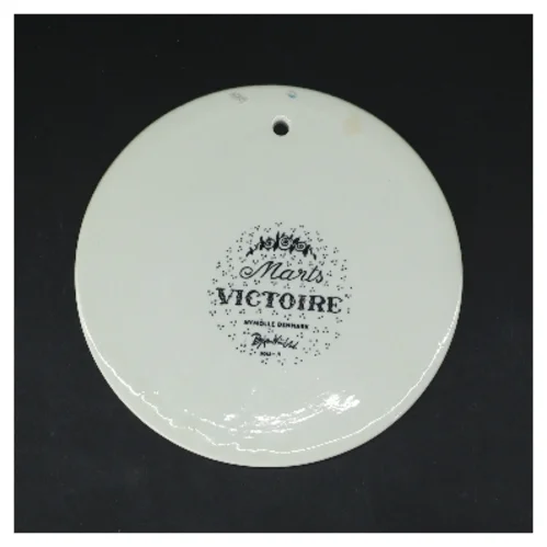 Vægdekoration Marts Victoire fra Bjørn Wiinblad (str. Ø 15,5 cm)