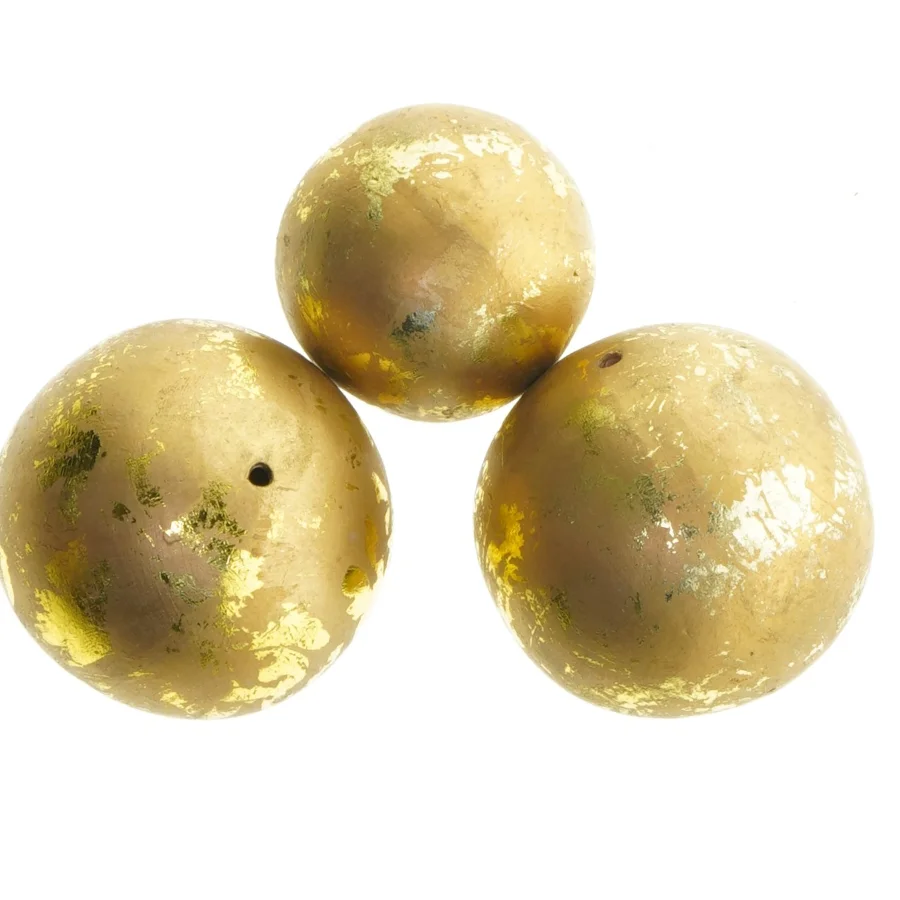 Dekorative guldkugler i keramik 