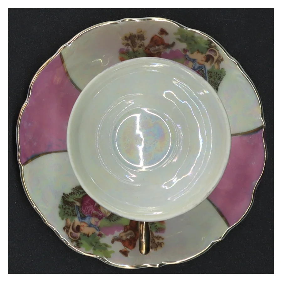 Porcelænskop og underkop (str. Diameter 11,5 cm op 7 x 4 cm)