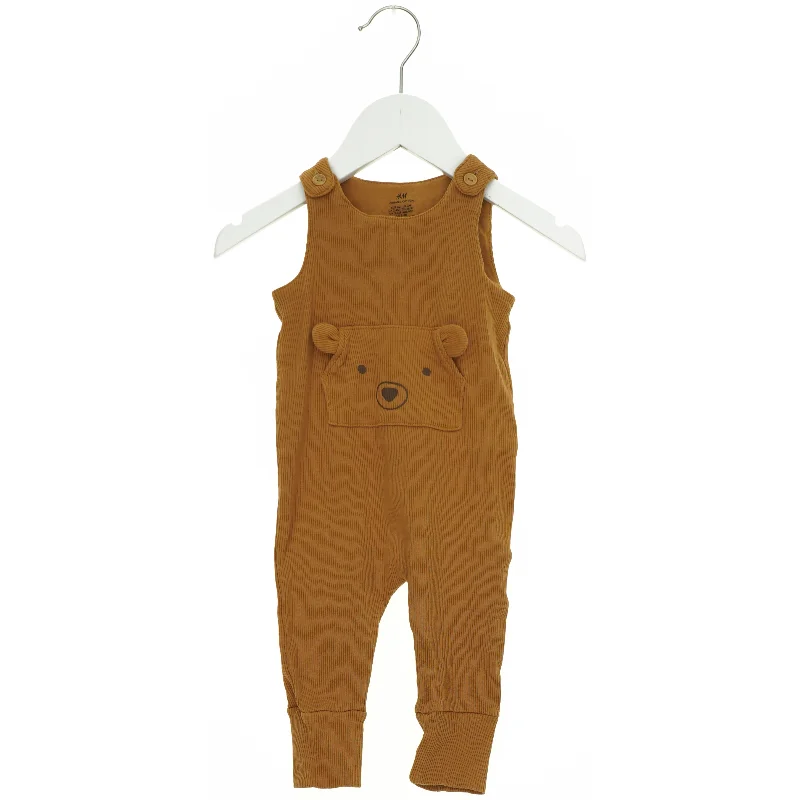 Buksedragt fra H&M (str. 62 cm)