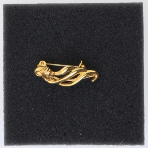 Guldtonet broche (str. 3,5 cm)