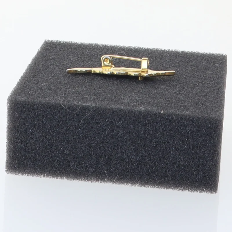 Guldfarvet broche med blå sten (str. 4 cm)