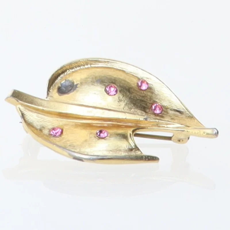 Delfinbroche med lyserøde sten (str. 4,5 x 3 cm)