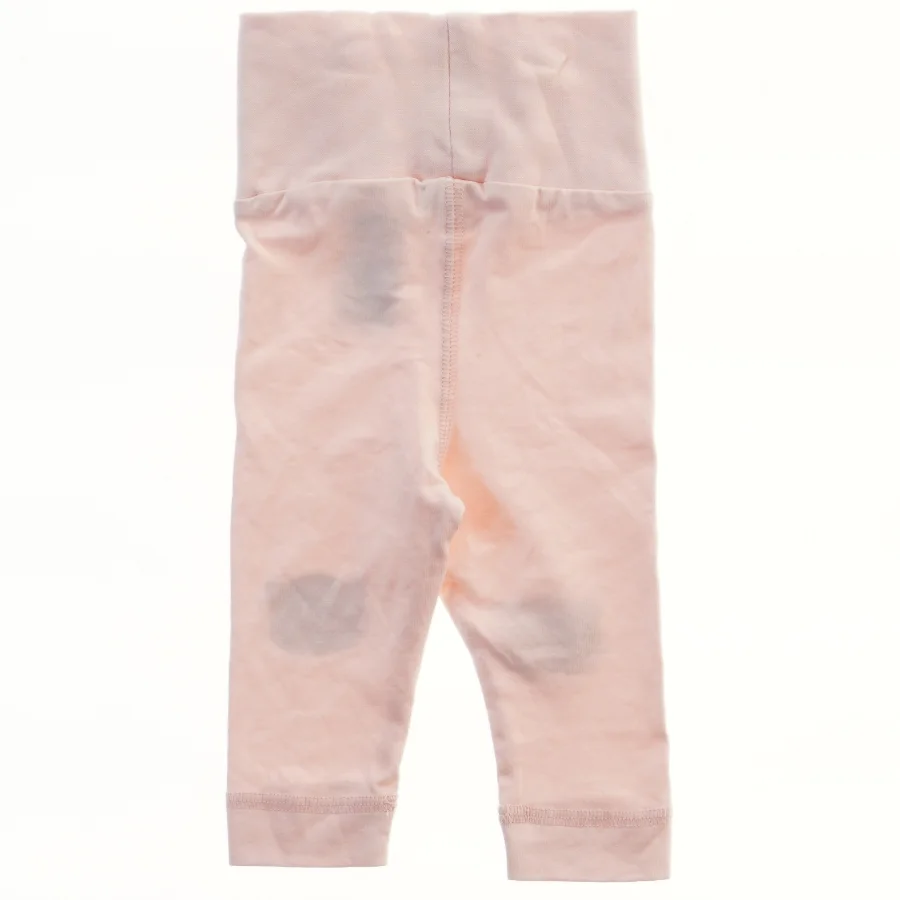 Lyserøde leggings med leopardansigt på knæene fra H&M (str. 56)
