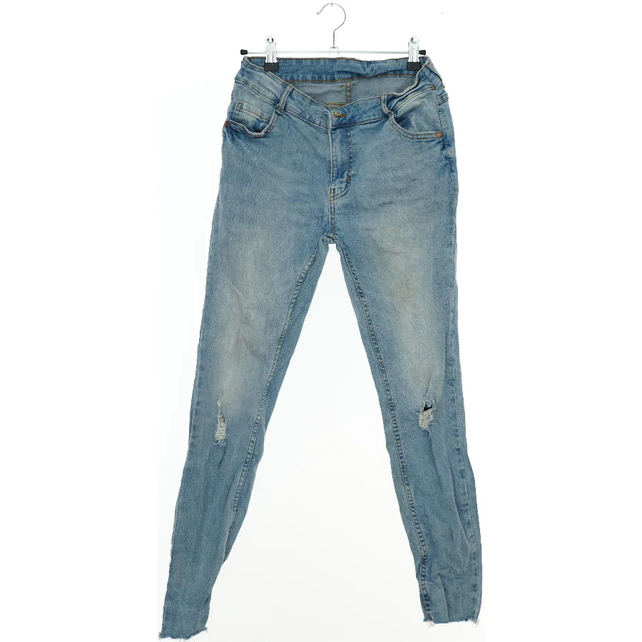 Ripped jeans i lys blå denim fra Fb Sister
