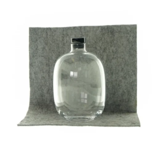 Flaske i klart glas med låg