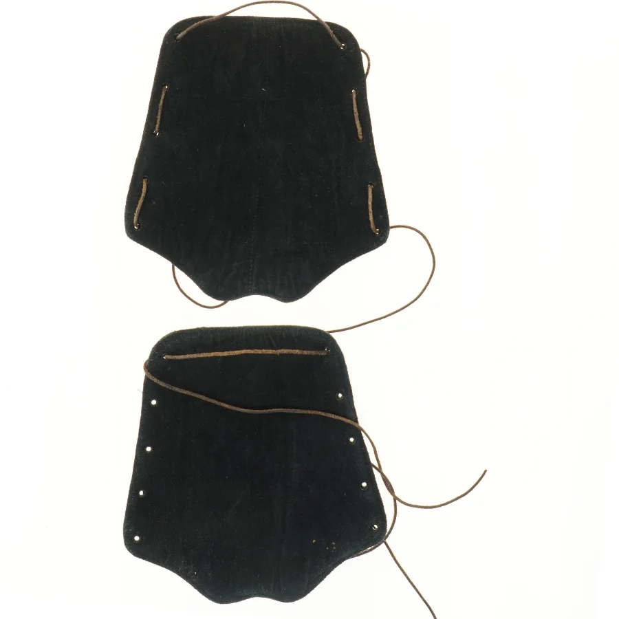 Drage skulderbeskyttere i læder (str. 33x31 cm)