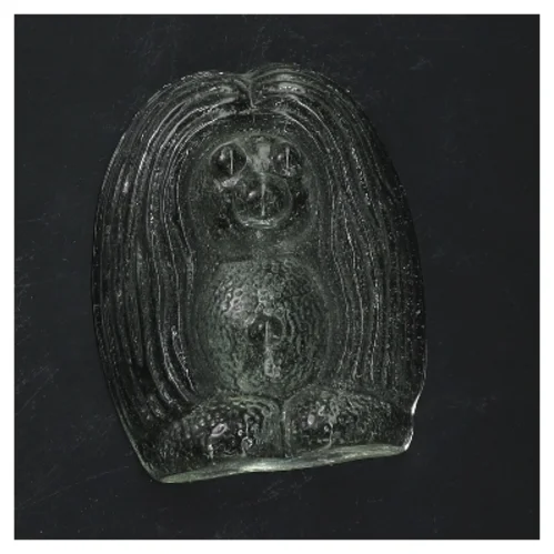 Orrefors bogstøtte i glas formet som et dyr (str. 10x8 cm)