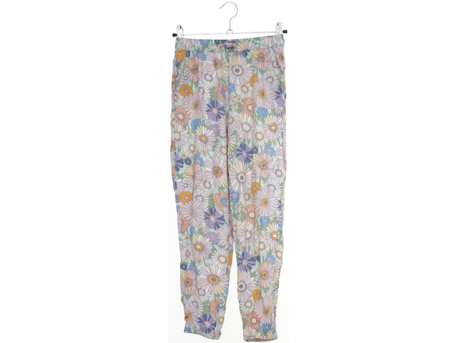Bukser med blomsterprint fra H&M (str. 140)