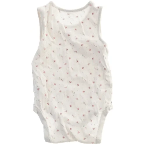 Baby bodystocking med blomstermønster fra Next (str. 86)