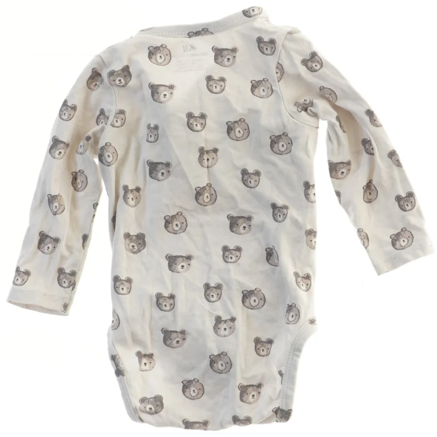 Langærmet bodystocking med bamsemotiv fra H&M (str. 62)