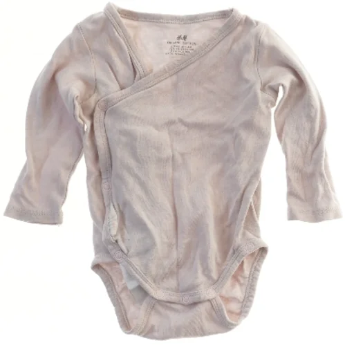 Langærmet bodystocking til baby fra H&M (str. 62)