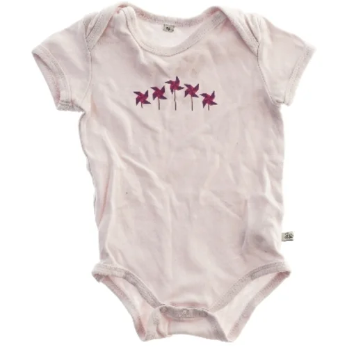 Lyserød bodystocking med karruselmotiv fra Pippi (str. 68)