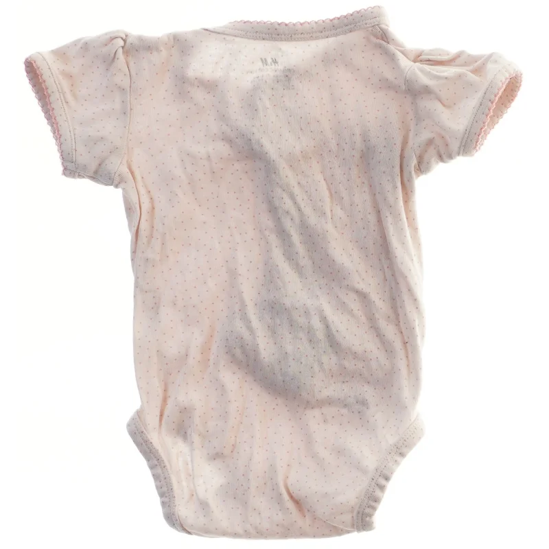 Lyserød bodystocking til baby fra H&M (str. 68)