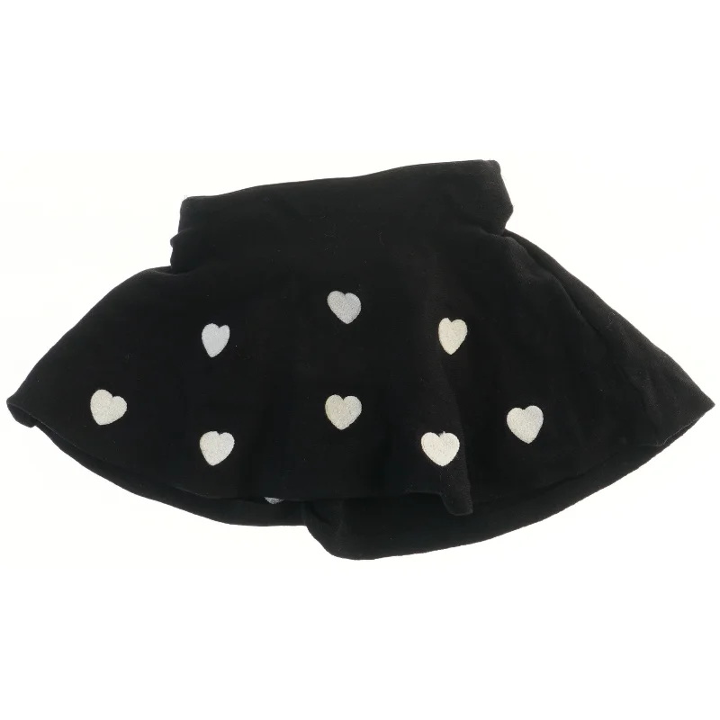 Sort nederdel med hvide hjerter fra H&M (str. 92)