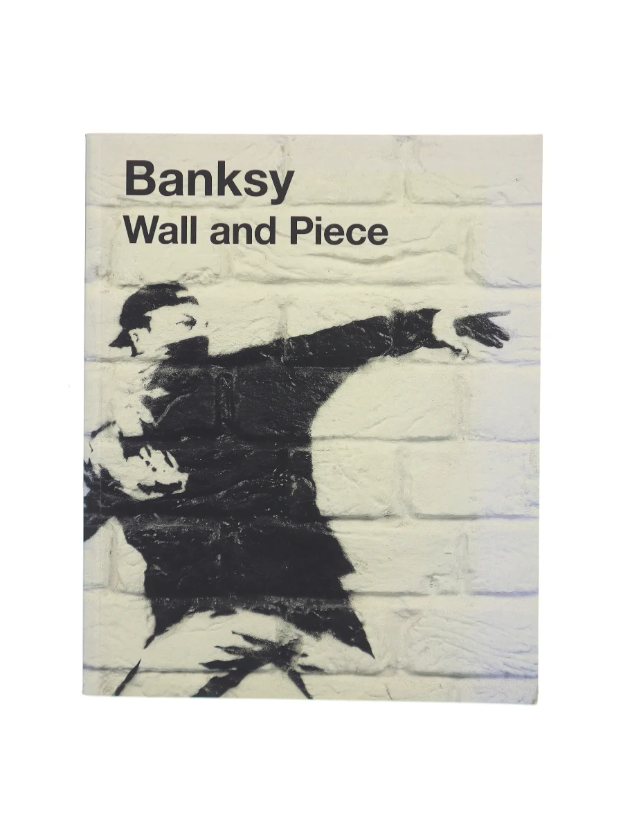 Forsiden af Wall and piece af Banksy