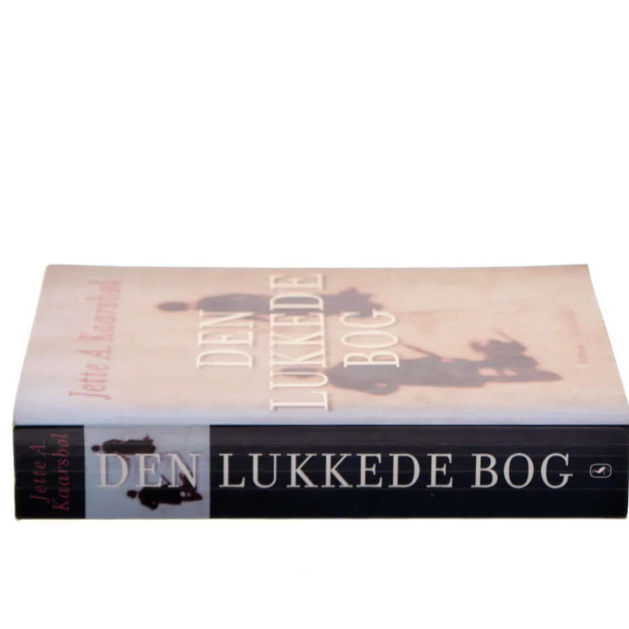 Den lukkede bog : roman af Jette A. Kaarsbøl (Bog)