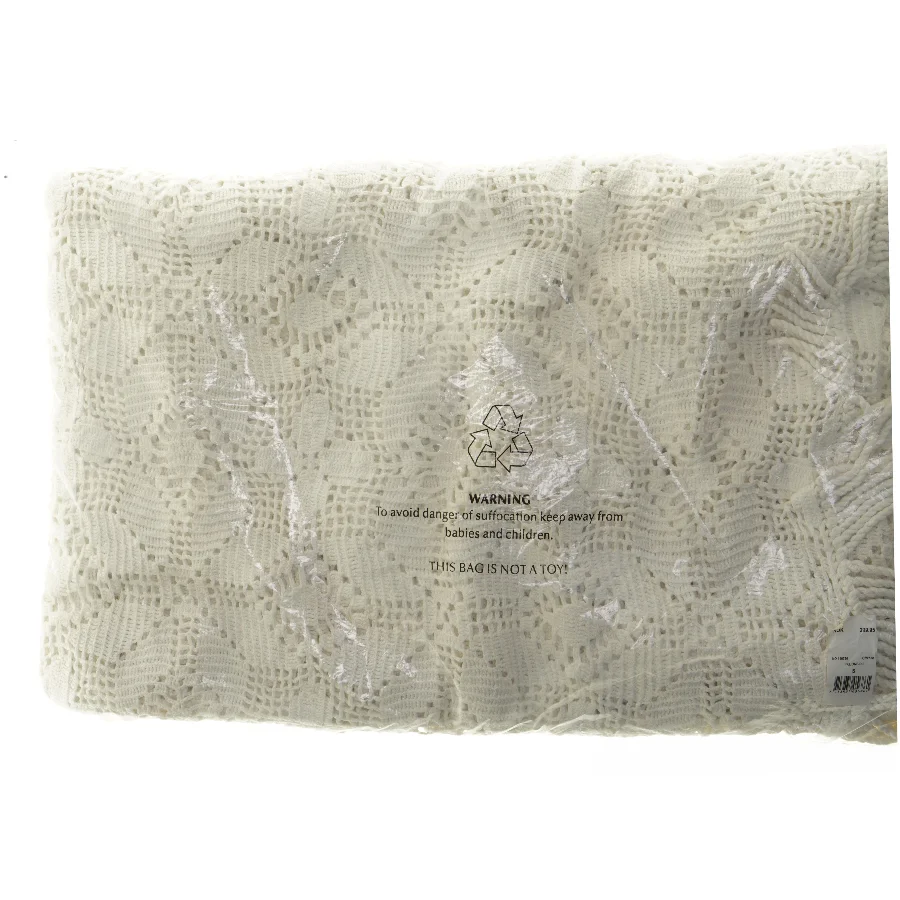 Hæklet hvidt sengetæppe med mønster