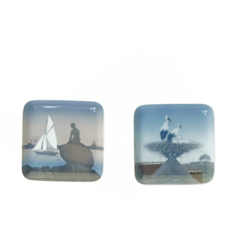 Askebægre med Den Lille Havfrue nr. 1300-6531 og Skål med Storkereden nr. 1300-6583 fra Bing Og Grøndahl (str. 12 x 12 cm)