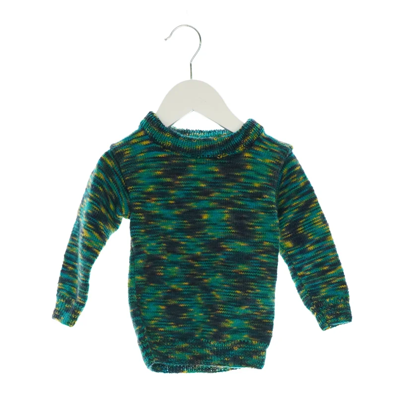 Hjemmestrikket sweater og sokker 