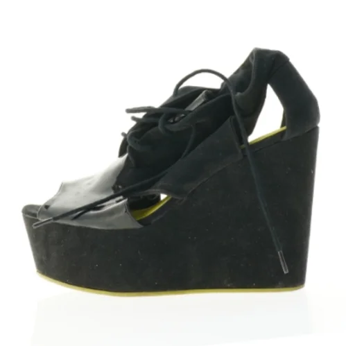 Sorte snørestøvler med kilehæl fra H&M (str. 40)