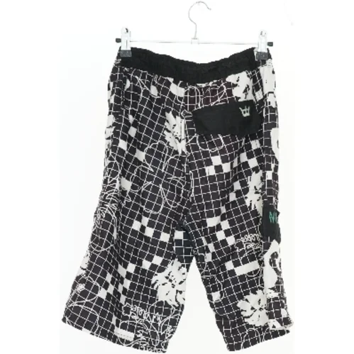 Badeshorts med blomsterprint (str. 164)