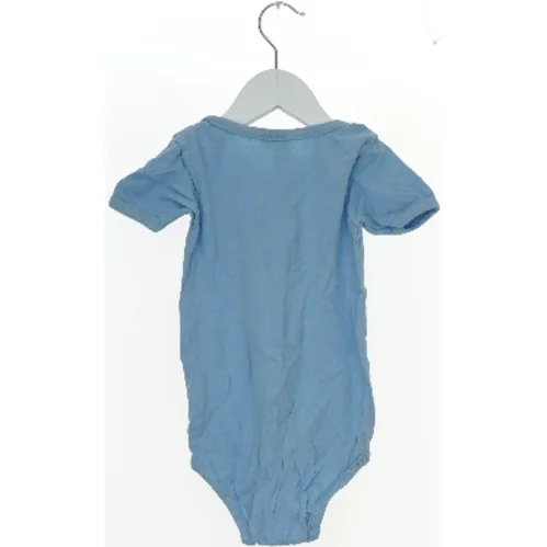 Blå bodystocking med print (str. 98)