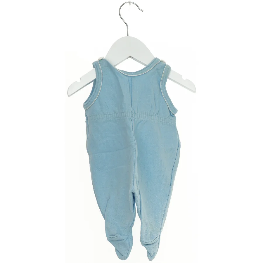 Blå sparkedragt med motiver fra Friends (str. 50)