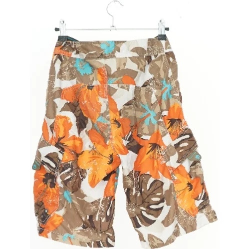 Blomstret shorts fra H&M (str. 140)