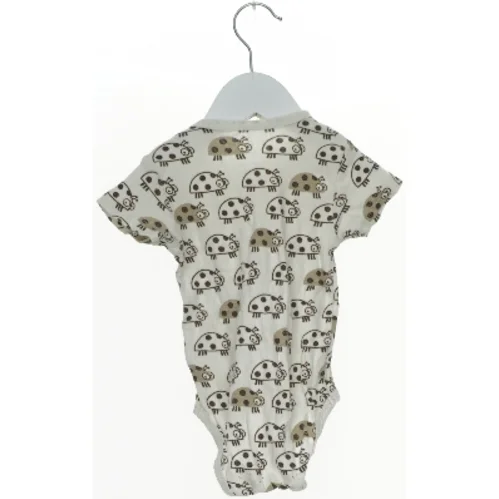 Børne bodystocking med mariehøne mønster (str. 74)