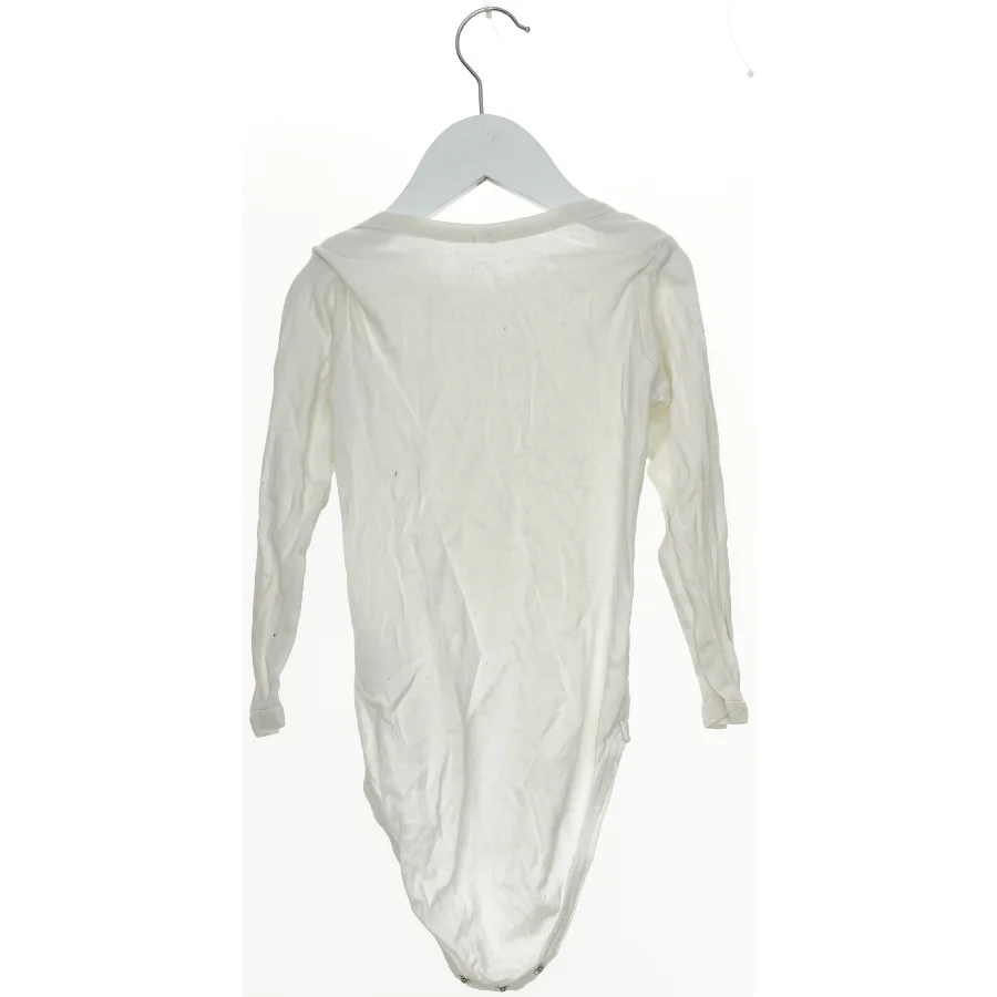 Hvid bodystocking med lange ærmer fra Name It (str. 92)