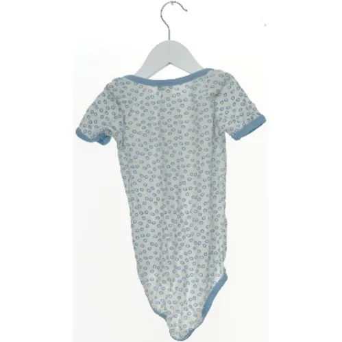 Babys bodystocking med print (str. 92)