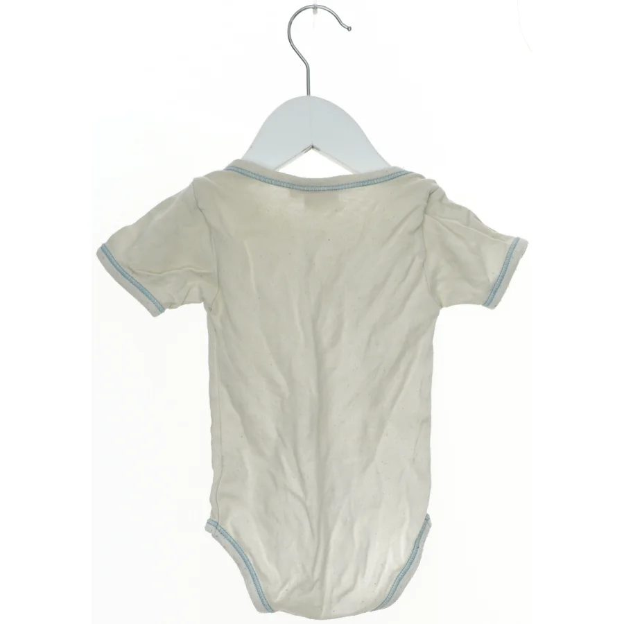 Baby bodystocking med tekst fra Mads & Mette (str. 68)