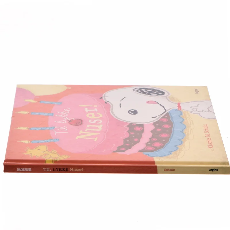 Radiserne - Tillykke Nuser af Charles M. Schulz (Bog)