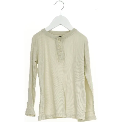 Langærmet bluse med knapper fra H&M (str. 104)