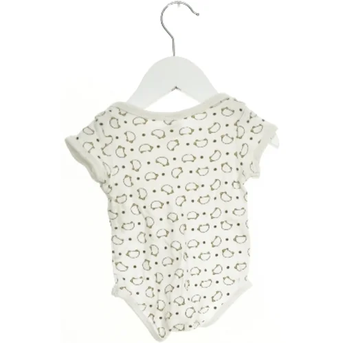 Baby bodystocking med mønster (str. 56)