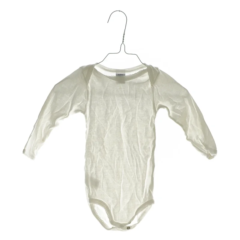 Langærmet bodystocking fra Petit Bateau (str. 18 mdr)