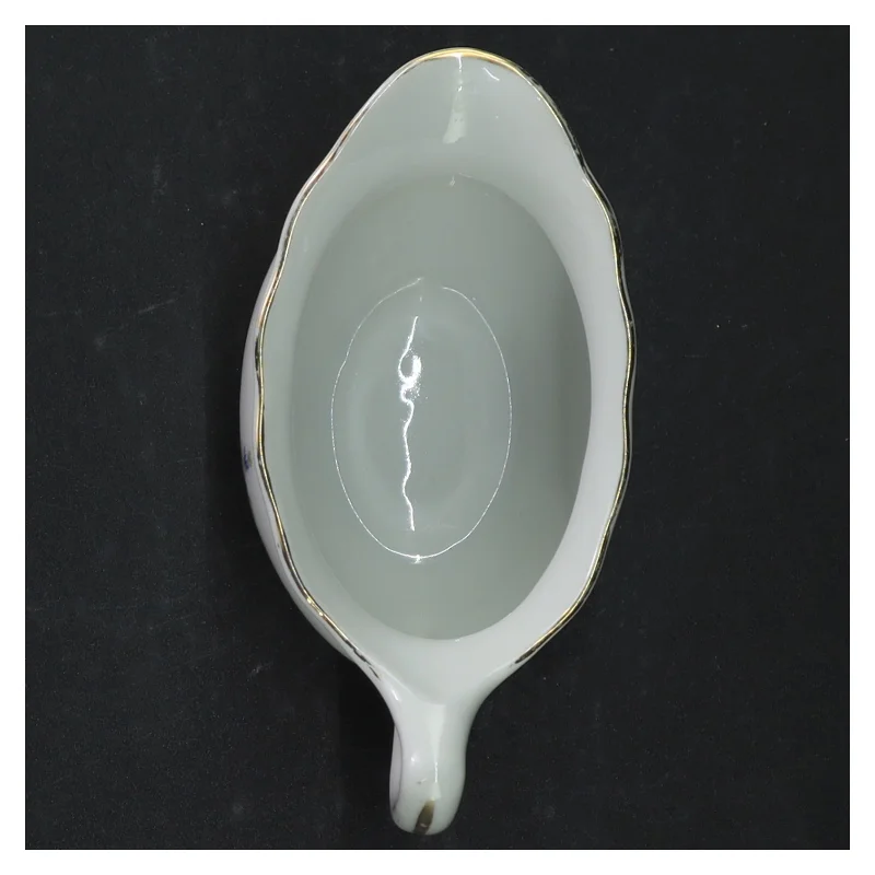 Porcelæn saucebåd med blomstermotiv