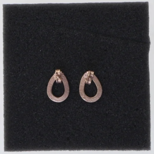 Øreringe i rosaguld farve