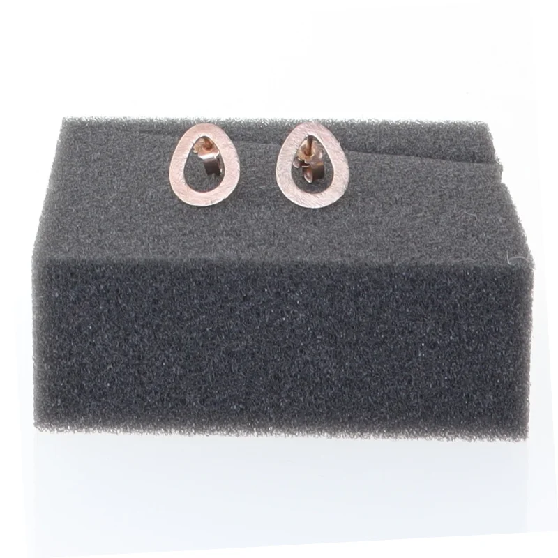 Øreringe i rosaguld farve