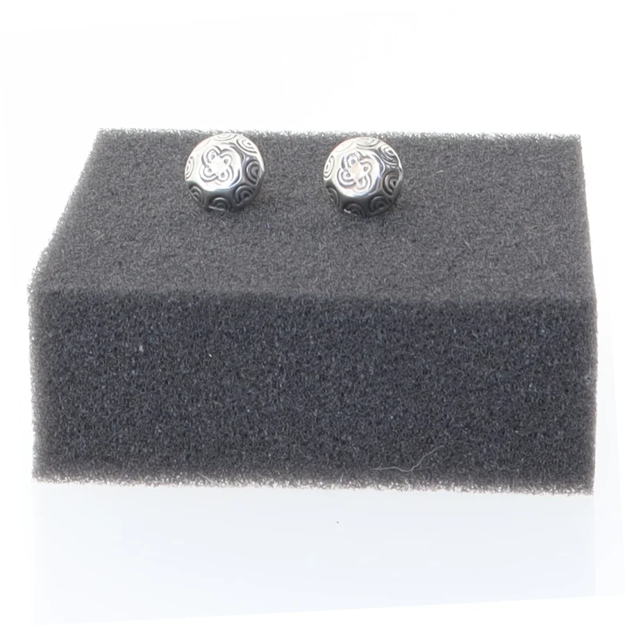 Sølvøreringe med mønster