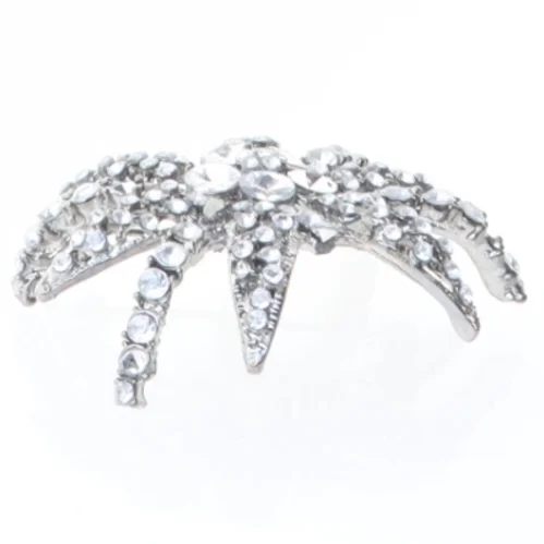 Sølvfarvet stjerneformet broche (str. 5,5 cm)