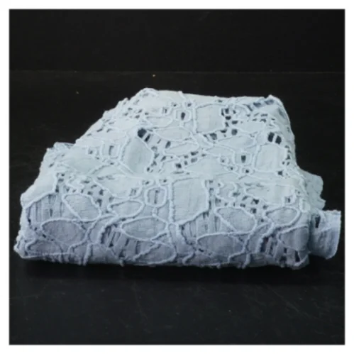 Blåt hulmønstret tekstil (str. 40 x 120 cm)