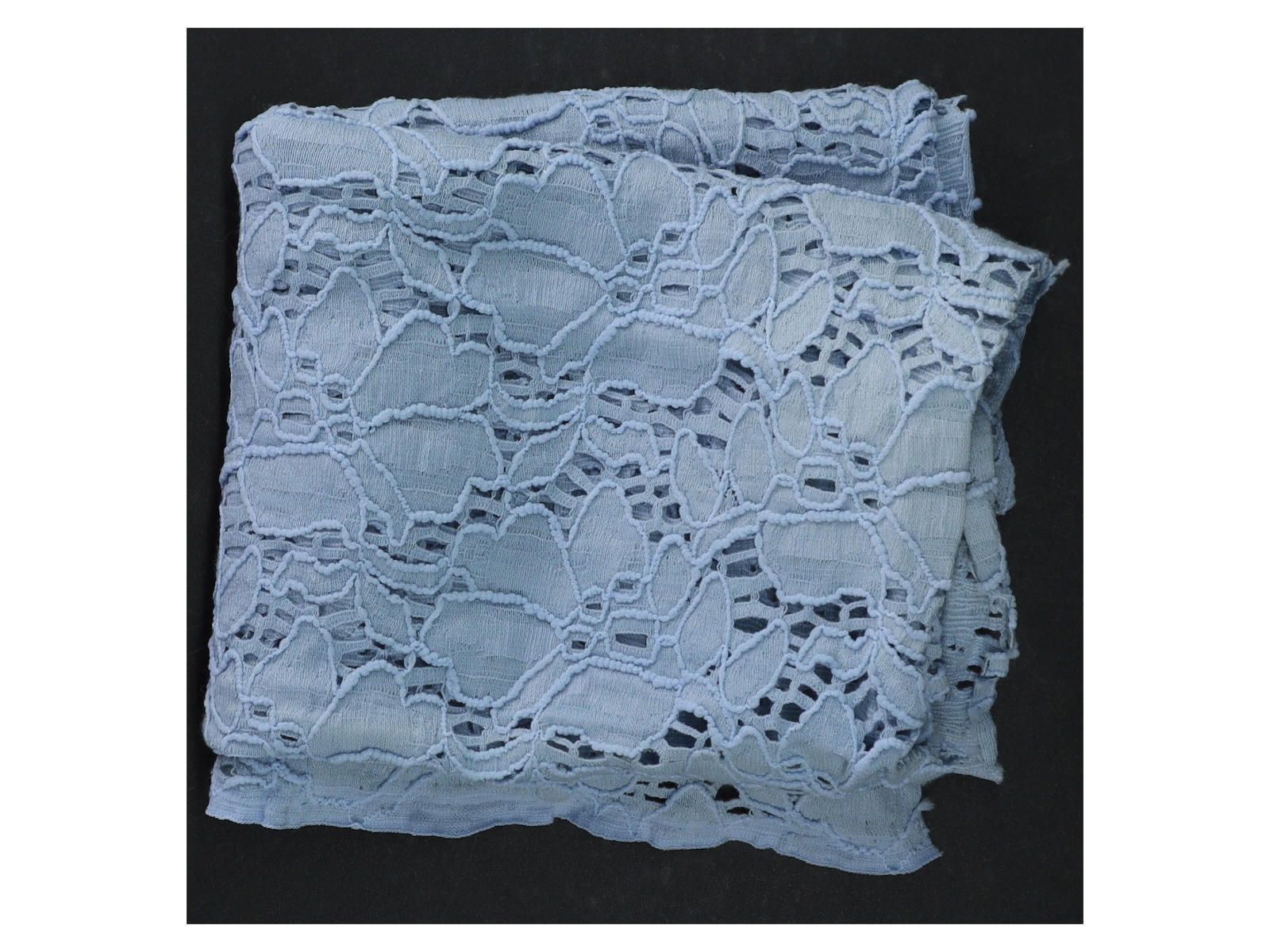 Blåt hulmønstret tekstil (str. 40 x 120 cm)