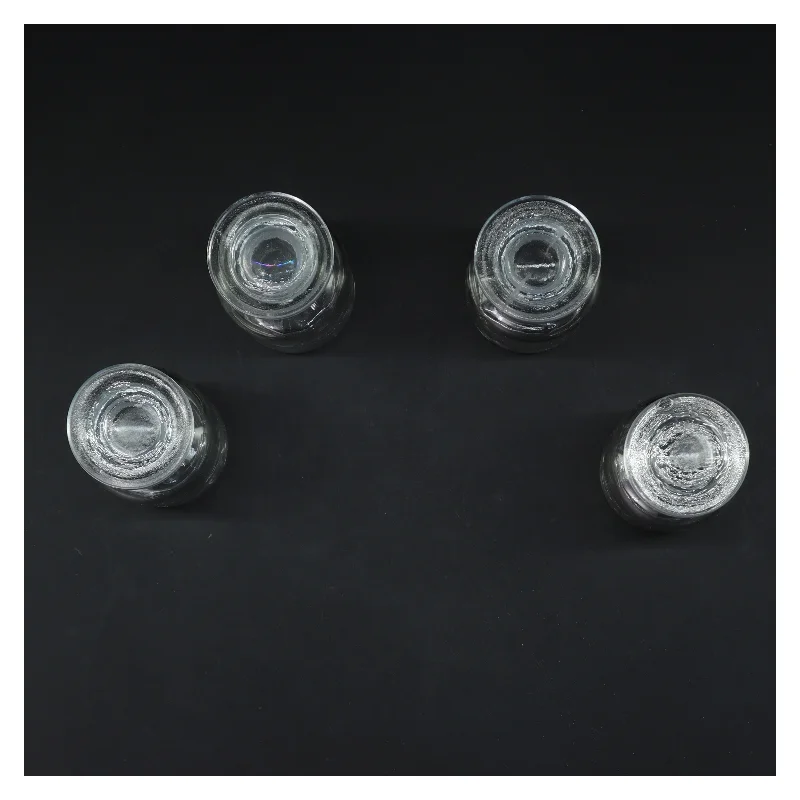 Fire små glasbeholdere (str. 4 stk 10 cm)